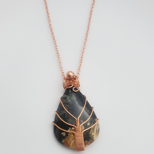 "Lotus Bug" - Palm Root Fossil Root Crystal Necklace